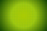 ひし形を散りばめた幾何学模様の緑色の背景素材