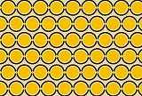 円を幾何学的に敷き詰めた黄色の背景素材